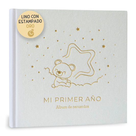 Álbum bebé lino dorado Lenoa Baby, portada de lino natural con estampado dorado, encuadernación cosida apertura 180º, 75 páginas papel 150 g FSC y pegatinas, árbol genealógico, 12 meses de hitos, tabla de crecimiento, regalo recién nacido y baby shower